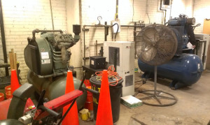 Photo of old equipment in air compression room.